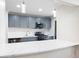 Modern kitchen featuring stone countertops, sleek appliances, and ample counter space at 1307 Wynnes Ridge Se Cir, Marietta, GA 30067