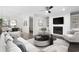 Cozy living room with fireplace, hardwood floors, and ample seating area at 1307 Wynnes Ridge Se Cir, Marietta, GA 30067