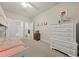 Comfortable bedroom featuring a bunk bed, a white dresser, and carpeted floors at 2316 Ridge View Dr, Loganville, GA 30052