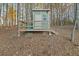 Outdoor shed with a wooden deck, perfect for relaxation and enjoying the surrounding nature at 2316 Ridge View Dr, Loganville, GA 30052