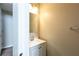 Bathroom featuring a vanity with a small mirror at 4060 Rockmill Cv, Ellenwood, GA 30294