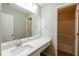 Bathroom featuring a large mirror and vanity at 4060 Rockmill Cv, Ellenwood, GA 30294