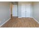 Bedroom featuring a closet with double doors and a light colored wall at 4060 Rockmill Cv, Ellenwood, GA 30294