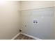 Laundry room featuring connections for a washer and dryer at 4060 Rockmill Cv, Ellenwood, GA 30294