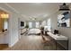 Virtually staged Primary bedroom featuring an office nook and ensuite bathroom at 4060 Rockmill Cv, Ellenwood, GA 30294
