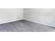 Neutral bedroom with gray carpet and white trim at 67 Blue Springs Sw Ct, Lilburn, GA 30047