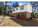 Beautiful two-story home with a brick and siding exterior and manicured landscaping at 67 Blue Springs Sw Ct, Lilburn, GA 30047
