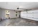 Spacious garage with concrete floors and natural light at 67 Blue Springs Sw Ct, Lilburn, GA 30047