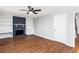 Living room with fireplace and wood floors at 67 Blue Springs Sw Ct, Lilburn, GA 30047