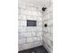 Close up of shower stall featuring modern tiling and hardware at 67 Blue Springs Sw Ct, Lilburn, GA 30047