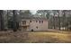 This home features a lush backyard and new rear deck at 1325 Classic Ne Dr, Conyers, GA 30013