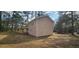 This home features a lush backyard and new rear deck at 1325 Classic Ne Dr, Conyers, GA 30013