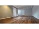 Finished basement featuring laminate flooring and neutral paint at 1325 Classic Ne Dr, Conyers, GA 30013