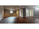 Finished basement features laminate flooring and neutral paint at 1325 Classic Ne Dr, Conyers, GA 30013