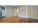 Bedroom with wood floors and neutral walls, featuring closet at 1325 Classic Ne Dr, Conyers, GA 30013