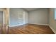 Bedroom with wood floors and neutral walls at 1325 Classic Ne Dr, Conyers, GA 30013