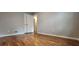 Bedroom features hardwood floors, neutral paint, and a closet at 1325 Classic Ne Dr, Conyers, GA 30013