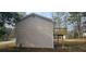 This home features a lush backyard and new rear deck at 1325 Classic Ne Dr, Conyers, GA 30013