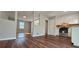 Updated kitchen features modern appliances, white cabinets, and wood-look backsplash at 1325 Classic Ne Dr, Conyers, GA 30013