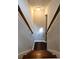 Staircase descends from the upper level with a wooden handrail at 1325 Classic Ne Dr, Conyers, GA 30013