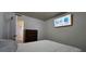 Bedroom featuring a comfortable bed and wall mounted TV at 2965 Pharr Court South Nw # 316, Atlanta, GA 30305
