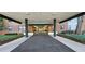 Inviting covered building entrance leads into the condo complex at 2965 Pharr Court South Nw # 316, Atlanta, GA 30305