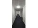 Hallway with carpet and white walls at 2965 Pharr Court South Nw # 316, Atlanta, GA 30305