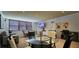 Bright living room with desk, television, dining table and comfortable seating at 2965 Pharr Court South Nw # 316, Atlanta, GA 30305