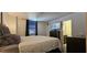 Serene main bedroom features neutral color palette and ensuite bathroom at 2965 Pharr Court South Nw # 316, Atlanta, GA 30305