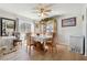Bright dining room with plenty of natural light and featuring wood floors and large windows at 760 Josh Ln, Lawrenceville, GA 30045