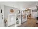 Bright foyer featuring a view into the dining room, with wood floors and white staircase at 760 Josh Ln, Lawrenceville, GA 30045