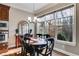 Cozy dining area with abundant natural light and modern window shades at 2421 Saint Davids Nw Sq, Kennesaw, GA 30152