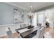 Dining room with chandelier, table for six, and stylish decor at 2421 Saint Davids Nw Sq, Kennesaw, GA 30152