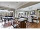 Stylish living room with a view into the kitchen and dining area at 2421 Saint Davids Nw Sq, Kennesaw, GA 30152