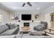 Beautifully decorated living room features modern entertainment setup and comfortable seating at 2421 Saint Davids Nw Sq, Kennesaw, GA 30152