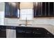 View of the kitchen sink and window, with stainless steel appliances and granite counters at 3480 Buffington Ln, Cumming, GA 30040