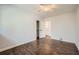 Bedroom featuring hardwood floors, a ceiling fan, and closet at 4279 Castle Pines Ct, Tucker, GA 30084