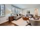 Bright living room with contemporary furnishings, hardwood flooring, and natural light streaming through the windows at 4279 Castle Pines Ct, Tucker, GA 30084