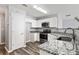 Well-lit kitchen featuring granite countertops and stainless steel appliances at 5446 Waterfall Ct, Atlanta, GA 30349