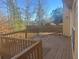 Wood deck overlooking a yard, perfect for outdoor entertaining at 9996 Village South Dr, Douglasville, GA 30135