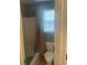 Bathroom with a tub/shower combination and a window for natural light at 9996 Village South Dr, Douglasville, GA 30135