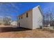 View of the back of the home including the exterior siding and access to a concrete patio at 3420 Lineview Dr, Ellenwood, GA 30294