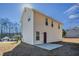 View of the back of the home including the exterior siding and access to a concrete patio at 3420 Lineview Dr, Ellenwood, GA 30294