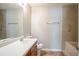 Bathroom featuring a single vanity, toilet, and shower-tub combo at 3420 Lineview Dr, Ellenwood, GA 30294