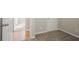 Hallway includes hardwood flooring, neutral walls and trim, and access to other rooms at 3420 Lineview Dr, Ellenwood, GA 30294