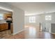 Open-concept living space with modern flooring, natural light, and easy access to the kitchen at 3420 Lineview Dr, Ellenwood, GA 30294