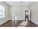 Bedroom featuring hardwood floors, an accent wall, and a ceiling fan at 1057 Regent Sw St, Atlanta, GA 30310