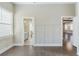 Bedroom with hardwood floors and an entry to a bathroom and living room at 1057 Regent Sw St, Atlanta, GA 30310