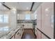 Bright kitchen featuring a granite island, stainless steel appliances and decorative backsplash at 1057 Regent Sw St, Atlanta, GA 30310