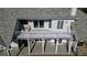 Aerial view of a balcony with an exterior seating area overlooking the backyard at 2150 Fincher Rd, Canton, GA 30114